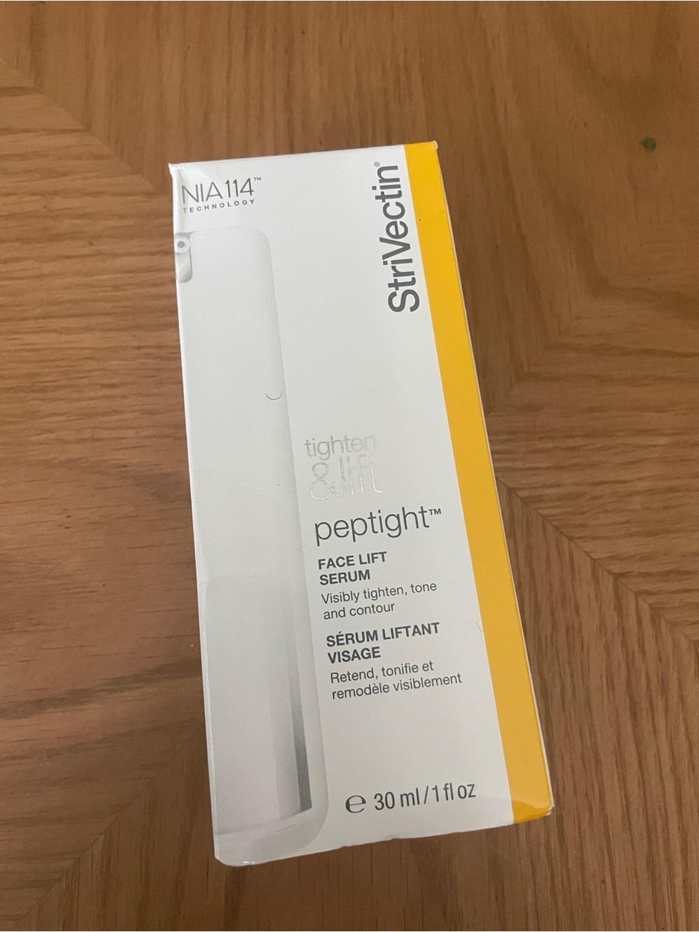 StriVectin Peptight Face Lift Serum - White with Yellow Accent